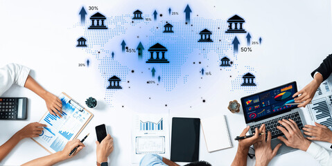 A business team engages in collaboration, analyzing financial growth with charts and a global map, illustrating trends and data relevant to banking and market strategies. Trope