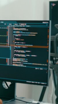 Vertical Screen : Group Adult Asia male, female freelance typing write prompt AI bot app smart program nomad, video game, terminal with coding language, designer, big data center on desktop computer.