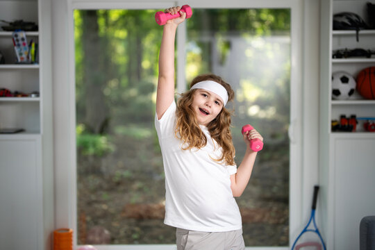 Kids doing sport fitness at home. Little boy exercising at home. Kid practicing fitness at home. Child stretching body for healthy lifestyle. Kid enjoying sport fitness at home. Kid workout in kids - Powered by Adobe