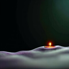 A single candle burns brightly on a textured surface against a dark background, creating a sense of peace and tranquility.