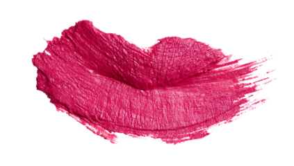 Close up of a vibrant pink lipstick smear with a textured finish representing a kiss mark isolated on transparent background