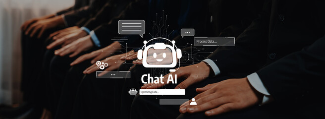 Professionals in suits demonstrate engagement with AI technology in a business meeting, highlighting the integration of communication tools for data processing. Trope
