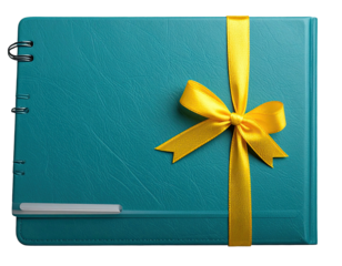 Teal book tied with gold ribbon, spiral bound