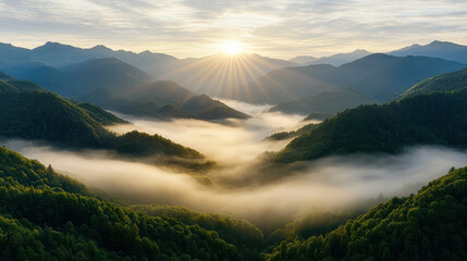 Serene mountain valley sunrise mist layers peaceful morning glow