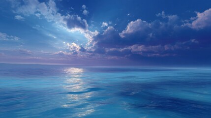 Fototapeta premium The sky is blue and the sun is shining on the water. The clouds are scattered throughout the sky, creating a peaceful and serene atmosphere