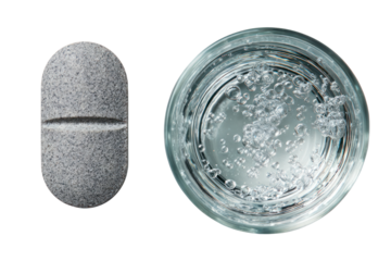 Pill and Glass of Water: Close-up of a single tablet beside a refreshing glass of water. A visual representation of health and wellness, ideal for medical and pharmaceutical content.