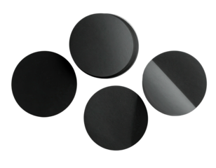 Four gray circles, top lit, against a dark backdrop