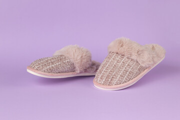 Cozy Furry Slippers on Purple Background