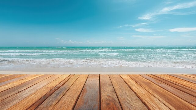 A wooden boardwalk overlooking a beautiful ocean. The boardwalk is empty and the ocean is calm