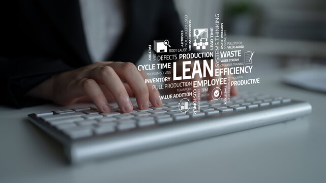 A business professional is seen typing on a keyboard, highlighting key concepts of lean management, including efficiency, productivity, and waste reduction practices in the workplace. Tessel