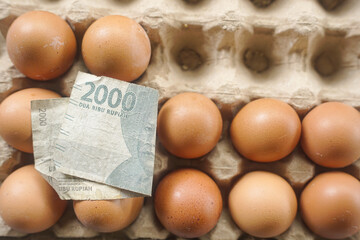 Eggs with Indonesian Rupiah &ndash; Concept of Food Inflation and Rising Living Costs