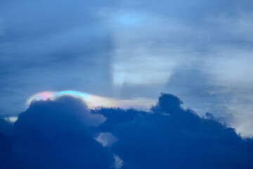 The cloud has rainbow colors.