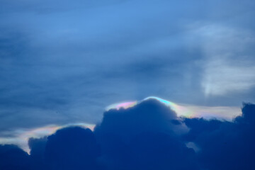 The cloud has rainbow colors.