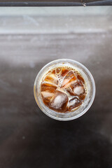 Iced black coffee in a plastic cup