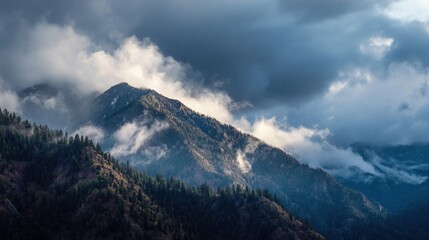 Obraz premium Stunning Clouds Forming Above High Mountains With Deep Natural Contrast