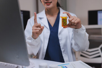 Doctor holding pill bottle advising patient online