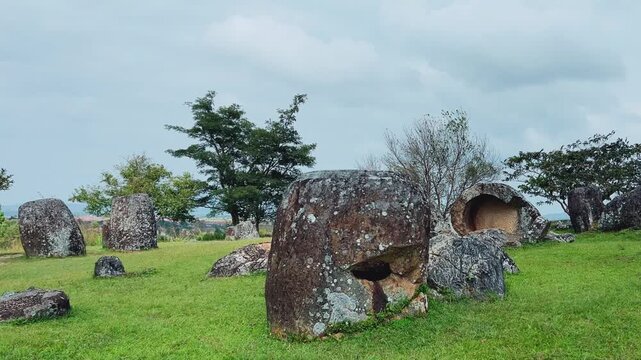 Valley of the Jars, Laos. Phongsavan. Valley of the Jars. The megalithic archaeological landscape consists of thousands of stone jars scattered across the Xiangkhouang Plateau. 4К
