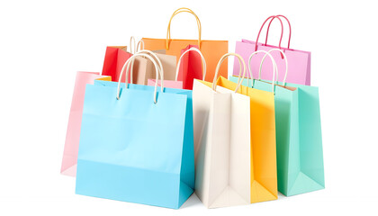 Brightly colored paper shopping bags stacked together isolated on white background