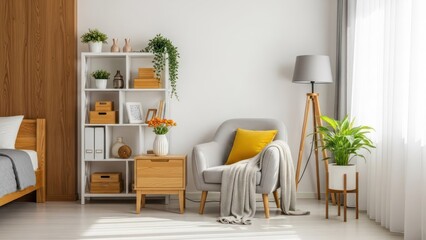 Bright, modern bedroom corner with gray armchair, bookshelf, and light wood accents