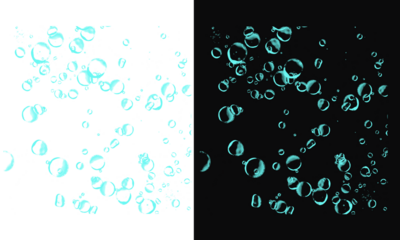 Abstract background with floating light blue bubbles on a dark black backdrop on transparent background