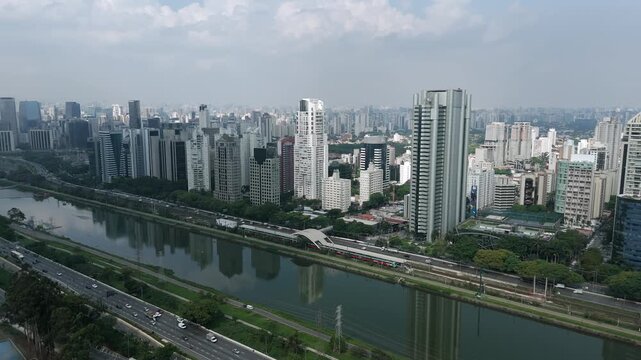 Aerial View Of Pinheiros River And Sao Paulo Skyline In Brazil.
