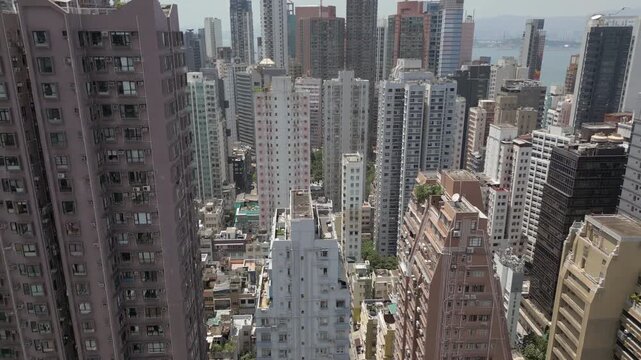 Iconic Hong Kong Apartment Buildings From Above China Drone Pull Back 4K 60FPS
