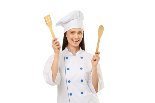 Chef joyfully poses with a spatula and spoon, isolated on white, PNG