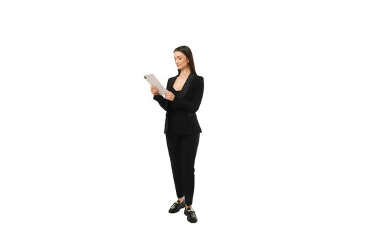 Businesswoman using a tablet, isolated on white, PNG
