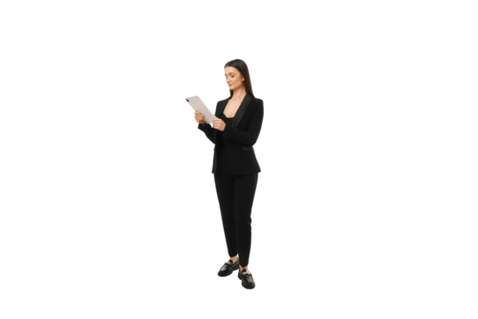 Businesswoman using a tablet, isolated on white, PNG