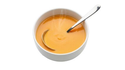 Creamy butternut squash soup in a bowl isolated PNG, healthy autumn meal with spoon on transparent background