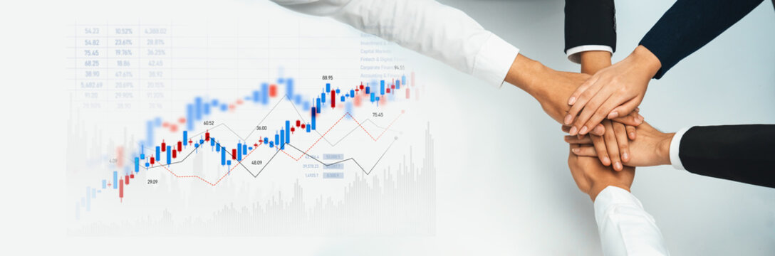 A group of diverse hands coming together over a financial growth chart, representing teamwork and unity in achieving business success and investment goals. Trope - Powered by Adobe