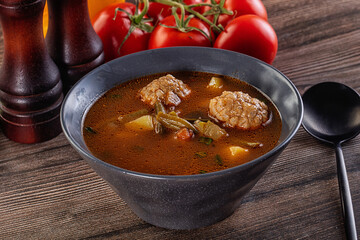 Tomato Soup with meatballs and vegetables
