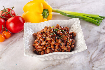 Black eye beans wutg tomato sauce