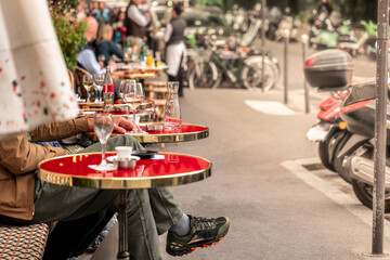 Paris France classic French sidewalk bistro cafe tables outdoor patio
