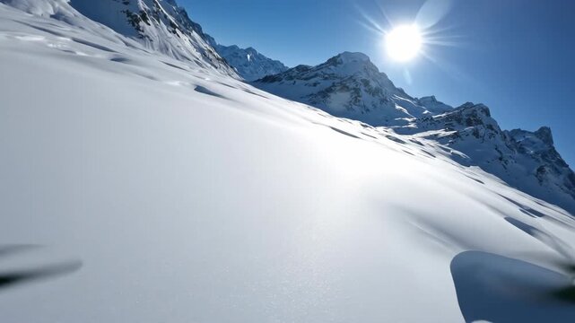 High altitude aerial drone gliding slowly over vast untouched white snowfields showing smooth natural abstract textures and isolation ice, geology, wilderness