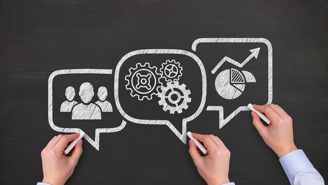 Concept image of business communication at meeting, Businessmen drawing speech balloons on chalkboard