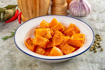 Vegan cuisine - baked pumpkin with herbs