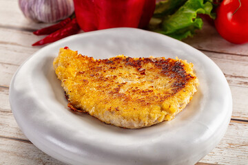 Breaded crispy chicken schnitzel