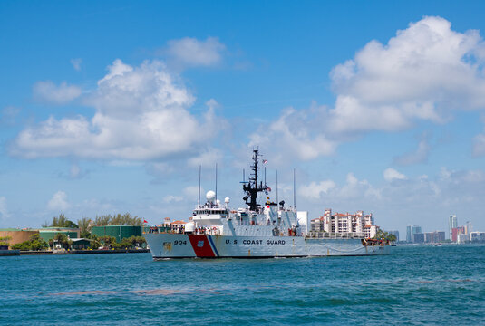 Miami, Florida, USA - July 19, 2025: Patrol ship of US coast guard with team. Coast guard patrol boat in sea. USCGC Harriet Lane. US coast guard boat. Medium Endurance Cutter