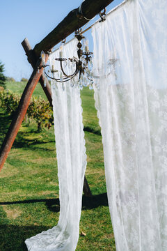 white wedding decor on a ceremony spot
