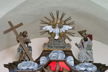 Holy Trinity, statue on the altar Adoration of the Magi in the parish church of Saint George in Durdic, Croatia