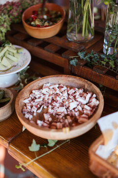 ham pieces in a wooden bowl