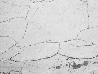 Crack wall texture background broken earthquake effect, whtie grey building cement damage pattern plaster grunge black line paint surface abstract, construction rough street concrete backdrop.