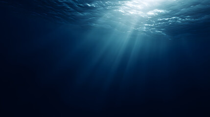 Serene underwater scene with sun rays penetrating the deep blue water creating a tranquil atmosphere