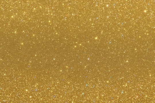 Glitter gold sparkle texture background.