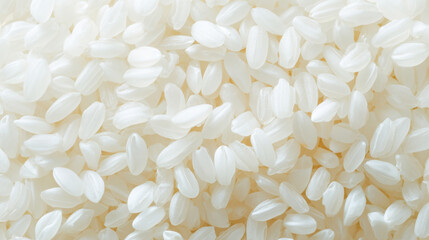 Close-up of uncooked rice grains on a white surface. macro shot showcases the texture and shape of Arborio rice, a staple in Italian cuisine.