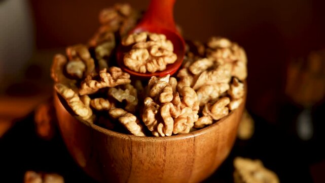 Peeled walnuts in a wooden bowl ready for cooking and snacking at home