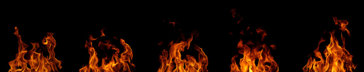 Realistic fire flames isolated on black background, burning effect with glowing orange heat. Perfect for overlays, design, visual effects, danger concepts, or dramatic backgrounds.