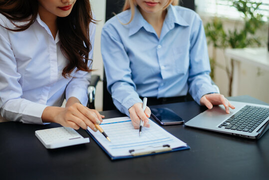 Business team collaboration discussing working analyzing with financial data and marketing growth report graph in team, presentation and digital tablet, laptop.