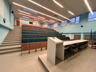 a tribune on a podium in a classroom
